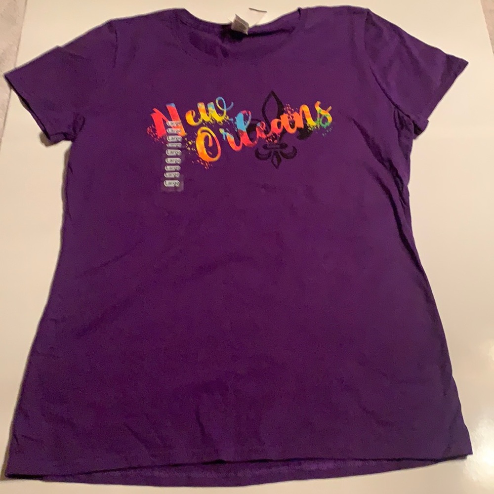 Size large women’s NEW T shirt. Purple New Orleans. Make an offer! Bundle!